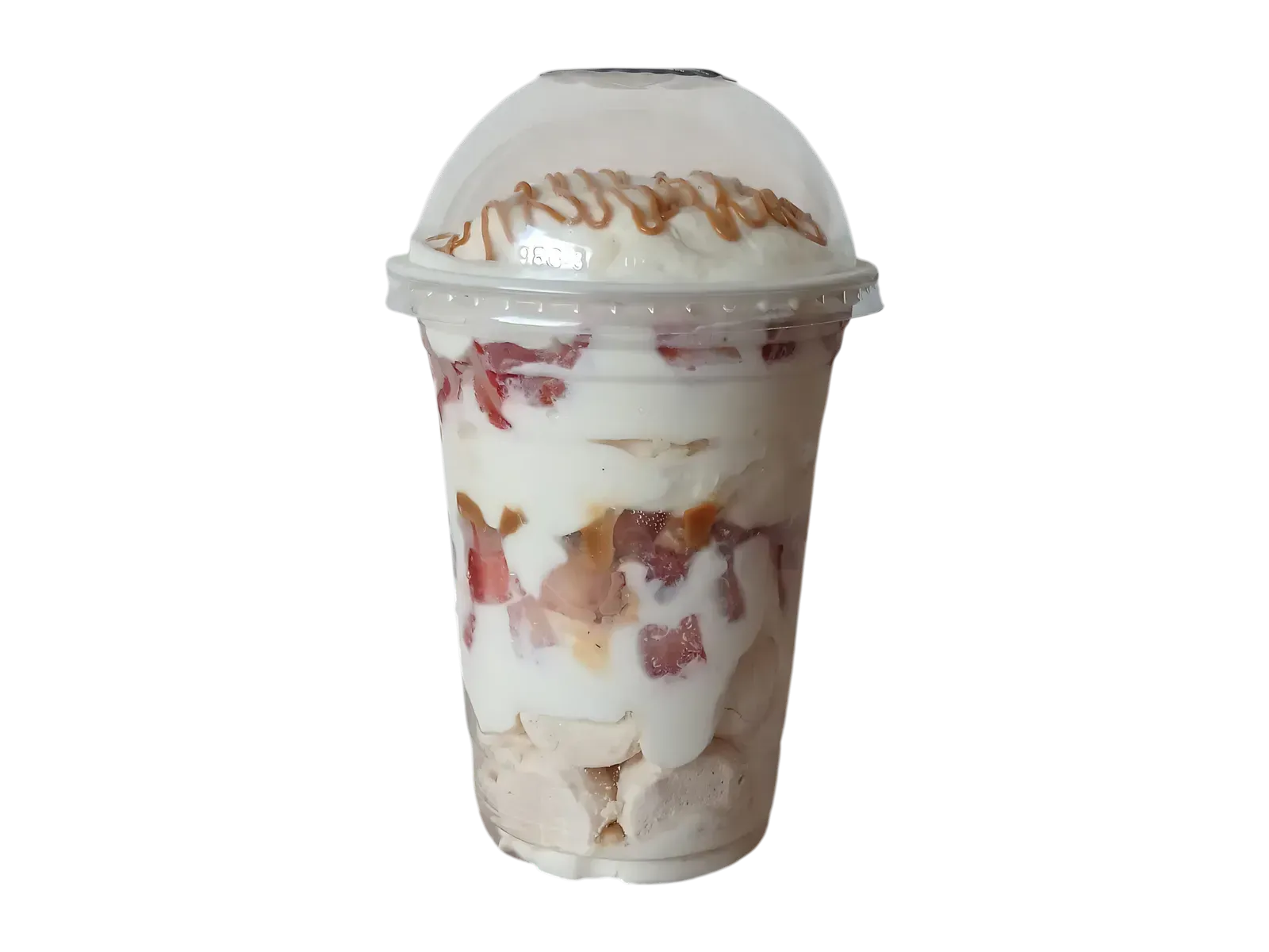 Vaso grande de merengue con capas de crema, frutilla y suspiro, coronado con crema e hilos de dulce de leche bajo su tapa